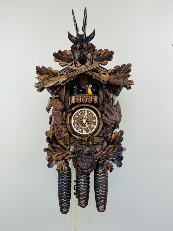 21" Eight Day Musical Hunter's Cuckoo Clock with Dancers - Hand-carved Dead Animals, Leaves, and Buck